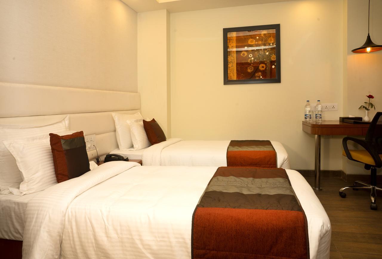Amalfi Grand Hotel Patna  Quarto foto