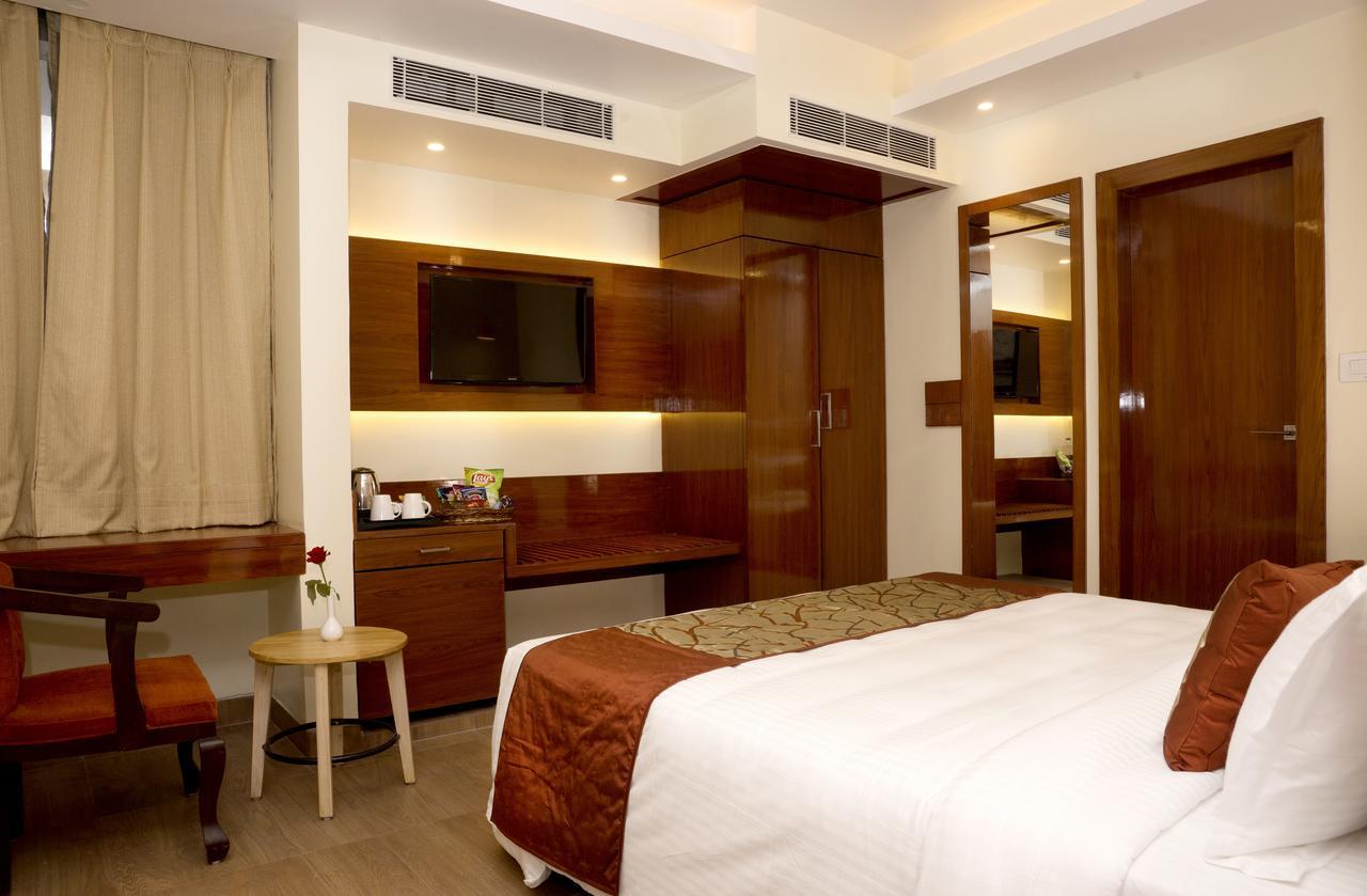Amalfi Grand Hotel Patna  Quarto foto