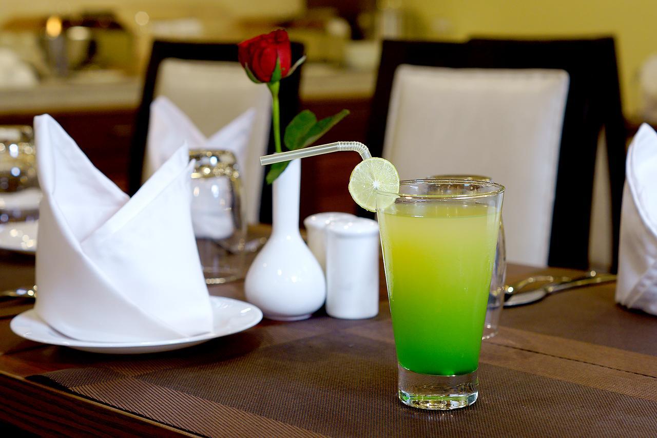 Amalfi Grand Hotel Patna  Quarto foto