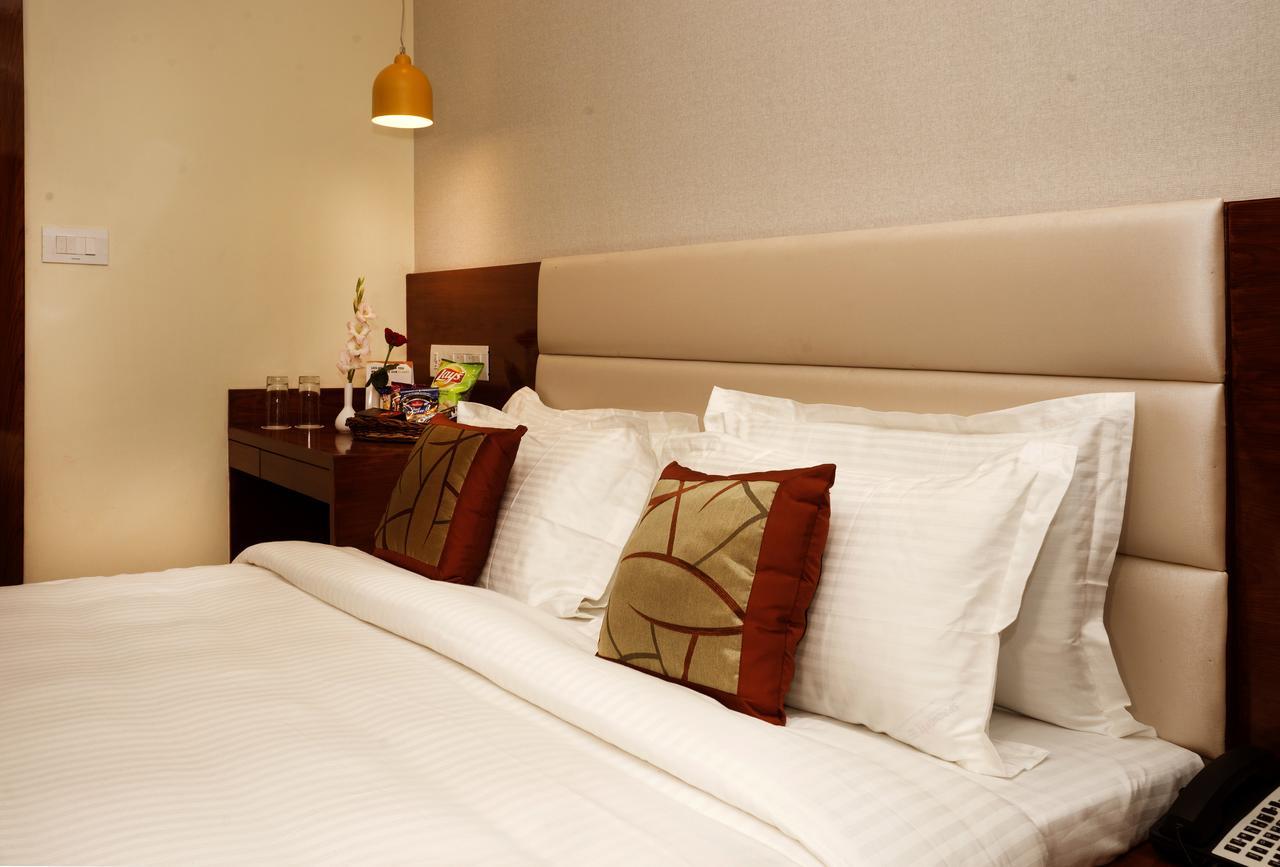 Amalfi Grand Hotel Patna  Quarto foto